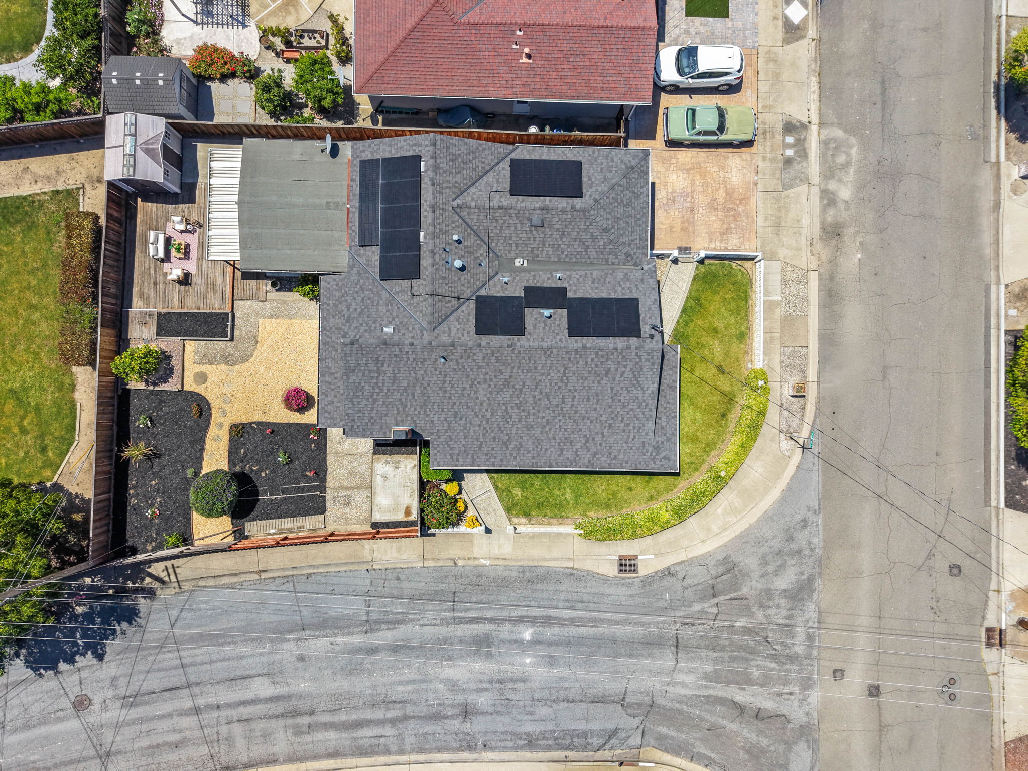 Top-down aerial showing the owned solar panels