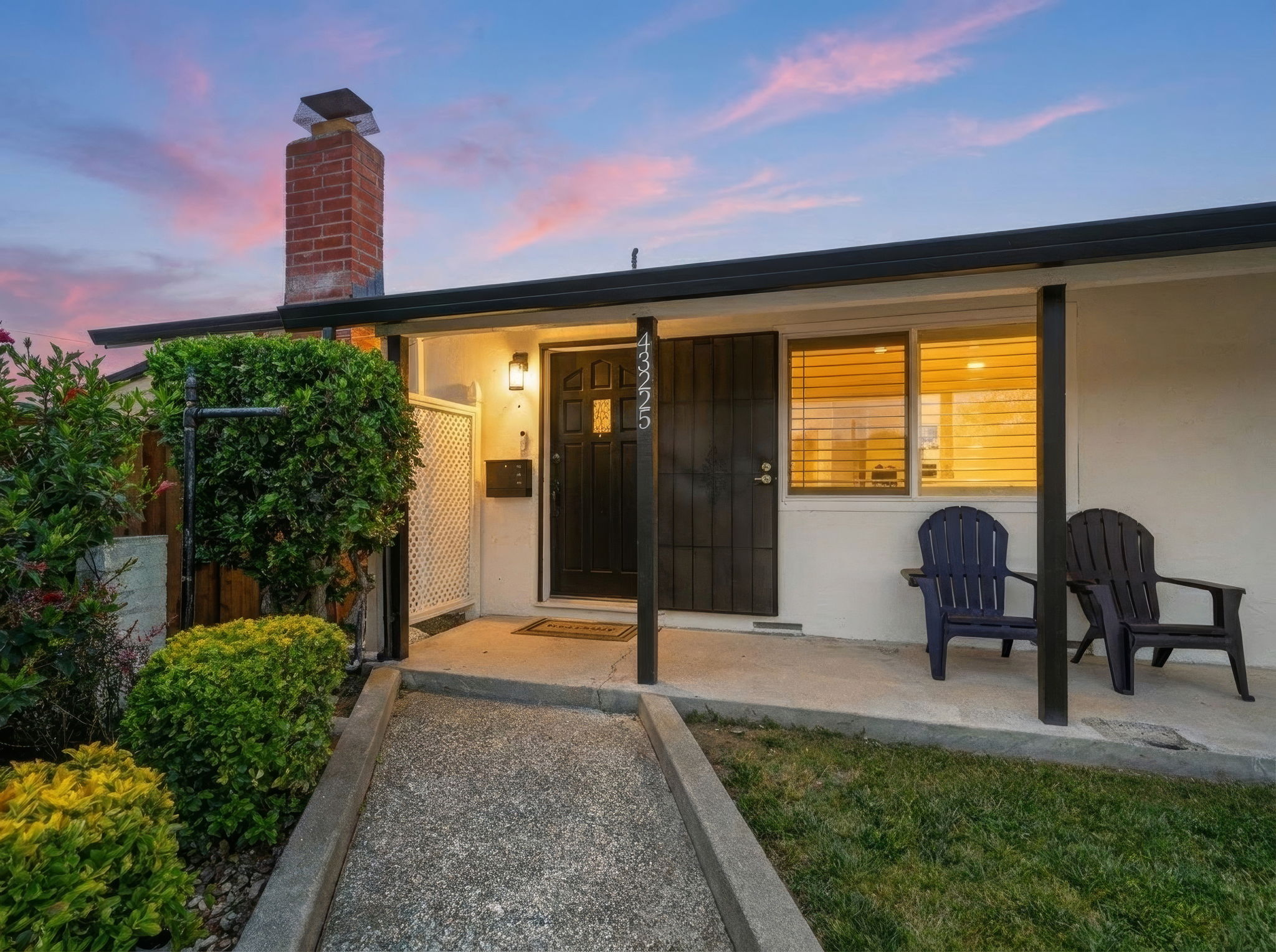 Front entry of the home at twilight