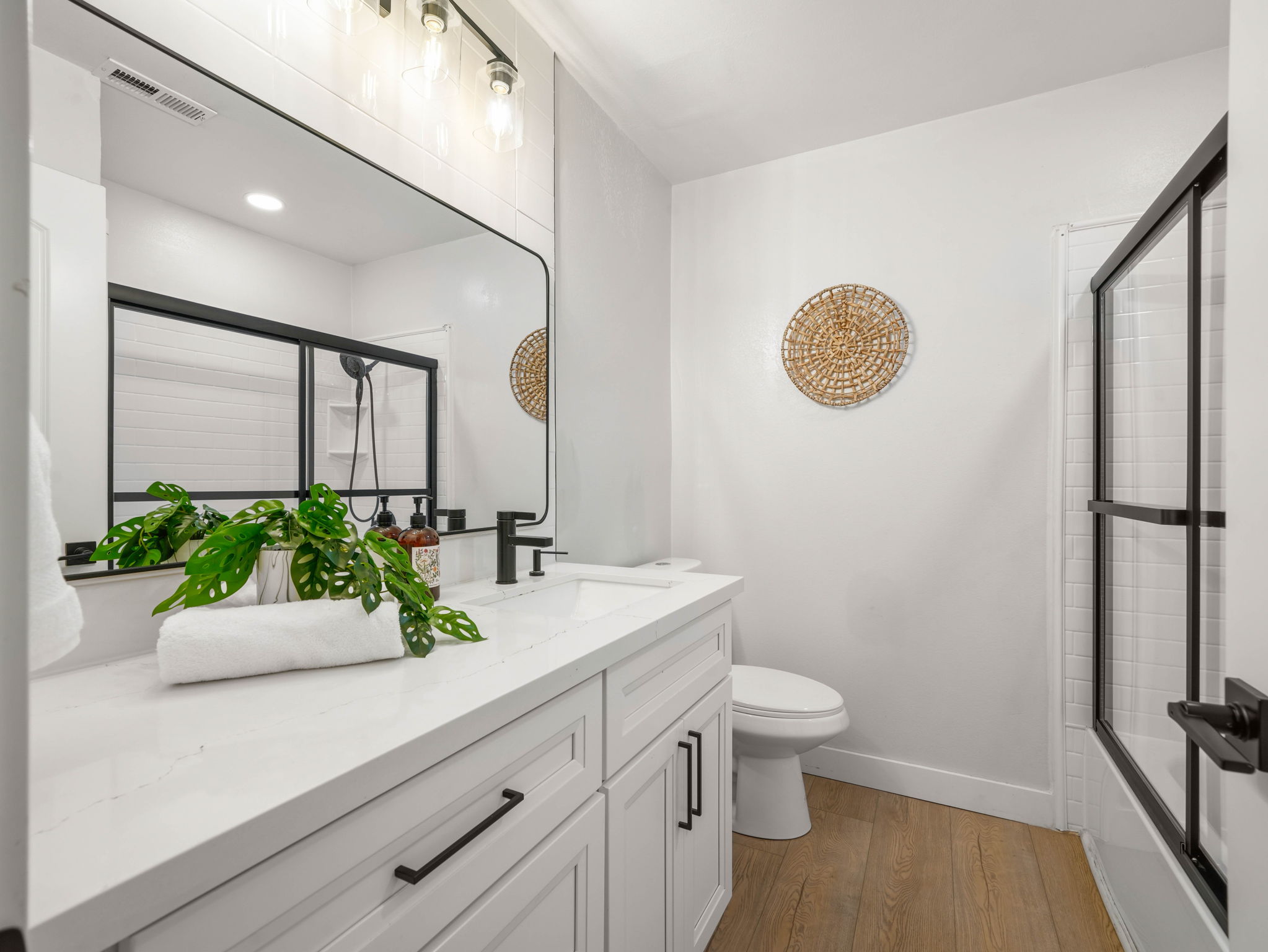 Hall bath with white finishes