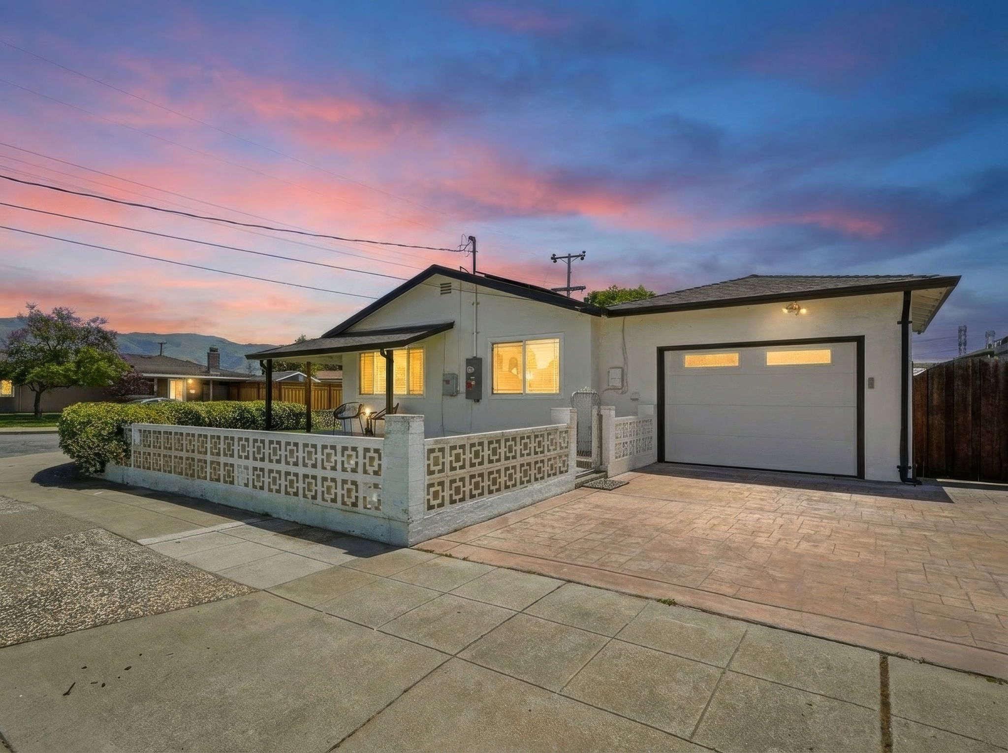 43225 Mintwood St front elevation at twilight with mountain views