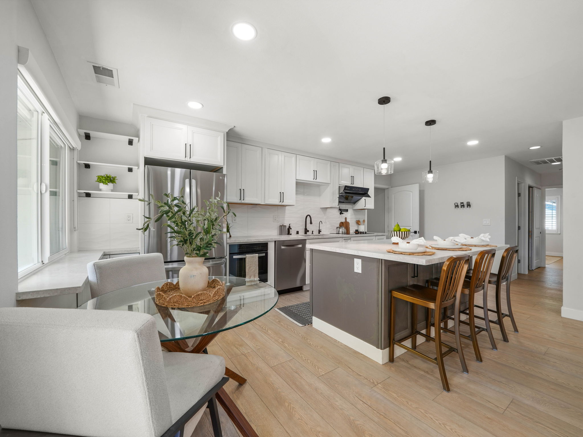 Breakfast nook off the kitchen with backyard view